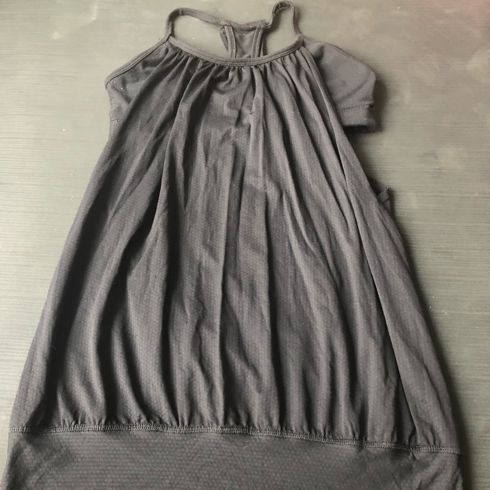 Black Lululemon No Limits tank with attached  bra.